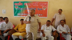 BJP Minister for Punjab Madan Mohan Mittal addressing a booth level workers camp at Samba on Thursday. -Excelsior/ Gautam