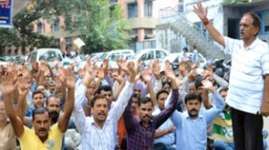 NMC workers raising slogans during rally at Jammu on Thursday.
