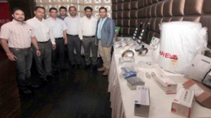 The team of Havells, Jammu office posing beside the displayed products during the concluding day of 2-day Electricians Mela at Jammu on Tuesday. -Excelsior/Rakesh