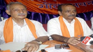 President, Sanatan Dharam Sabha, Jammu, Jagdish Dogra alongwith another office bearer addressing media persons at Jammu. -Excelsior/Rakesh