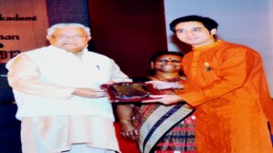 Natrang Actor/Director Asheish Nijhawan being awarded Bilmillah Khan Yuva Sangeet Natak Akademi Award by Shri Balkrishan Acharya, the Governor of Tripura and Nagaland at Rabindra Satabarshiki Bhawan, Agartala (Tripura). 