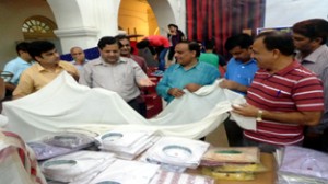 Dr N K Resutra and other dignitaries during exhibition on 'Khadi for Youth'.