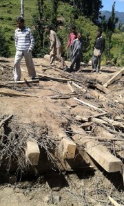 Villagers looking for victims as a house collapsed in Dudu area of Udhampur.