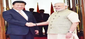 President of the People’s Republic of China Xi Jinping shakes hands with Prime Minister Narendra Modi in Ahmedabad on Wednesday.(UNI)