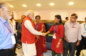 Prime Minister, Narendra Modi meeting ISRO scientists before Insertion of Mars Orbiter (Mangalyaan) into the Mars at ISRO Headquarters in Bangalore on Wednesday. (UNI) 