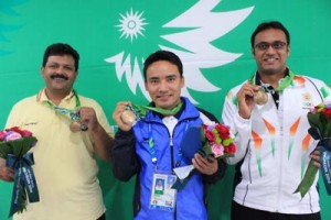 Indian men's shooting team (from left to right) Samresh Jung, Jitu Rai, and Prakash Papanna Nanjappa at the podium after winning bronze during the Asian Games in Incheon on Sunday. (UNI)