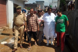 Minister for Housing Raman Bhalla visiting flood hit areas.