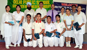 Winners of Quiz Competition posing for a group photograph at DPS Katra on Friday.
