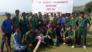 Cricket players posing with Army officers after T-20 match at Mendhar.