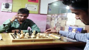 Players in action during Computer Point District Udhampur Open Chess Championship on Thursday.