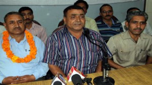 All Jammu,Kashmir & Ladakh Teachers Federation leaders addressing a press conference at Jammu on Thursday.
