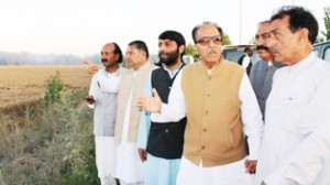 Prof Saif-ud-Din Soz visiting flood affected area of Pulwama. -Excelsior/Younis Khaliq