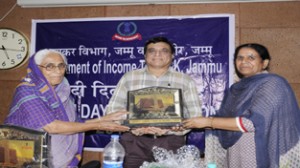 IT Commissioner A K Thatai, Dr Ved Kumari Ghai and Dr Parmeshwari during Hindi fortnight celebrations.