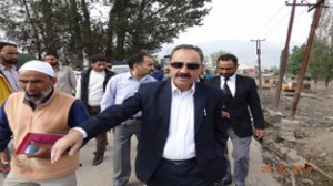 Justice Magray during visit to relief camp at Pampore on Thursday.