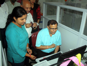 Vagish Chander Sharma inaugurating J&K Grameen Bank branch at Kaluchack.
