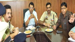 Divisional Commissioner Shantmanu chairing a meeting at Jammu on Tuesday.