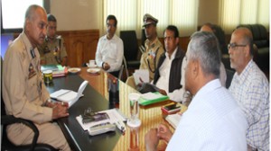DGP K Rajendra chairing a meeting at Police Headquarters at Srinagar on Wednesday.