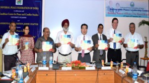 Vice Chancellor Prof MPS Ishar alongwith members from Japan, US & Korea unveiling pamphlets of Peace Club launched at Jammu University. 