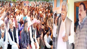 Minister for Planning, Ajay Kumar Sadhotra and Provincial President NC Devender Singh Rana addressing flood victims on Monday.