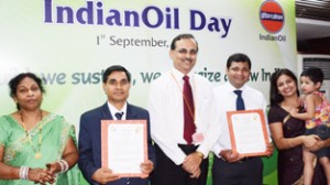 Sanjiv Singh, Director (Refineries), along with the award winners for the Best Suggestion of the Year and their family members.