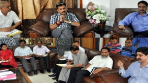 Minister of State for Cooperative, Dr. Manohar Lal Sharma chairing a meeting at Jammu on Monday.