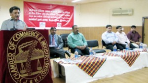 Financial Commissioner Industries and Commerce, Khursheed Ganai speaking at function organised by CCI & FICCI in Jammu on Thursday. -Excelsior/Rakesh