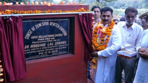 Minister of State for Fisheries, Dr Manohar Lal Sharma  laying foundation stone of bridge on Sunday.