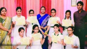 Students of DPS Jammu posing for a group photograph along with School Principal and other dignitaries.