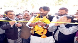 Minister for Tourism, Ghulam Ahmad Mir inaugurating high school building at Bamdooru on Tuesday.