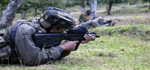 Army jawans in action at Handwara on Friday. -Excelsior/Aabid Nabi