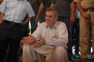 Chief Minister Omar Abdullah sitting with border migrants in a relief camp at Samba on Thursday.—Excelsior/Gautam