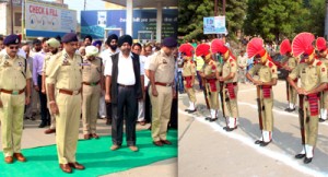 IGP Jammu Rajesh Kumar paying tributes to DySP Devinder Sharma and HC Gurbachan Singh at R S Pura on Monday.
