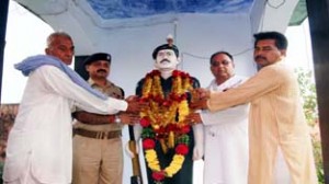 Floral tributes being paid to martyr Surinder Kumar Sharma  on Tuesday.