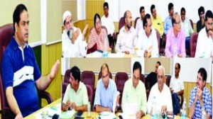 Minister of State for Technical Education Vikar Rasool chairing a meeting at Jammu on Friday.