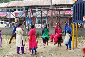 Back to normalcy after floods: Girls playing in a park at Pulwama on Thursday. — Excelsior/Younis Khaliq
