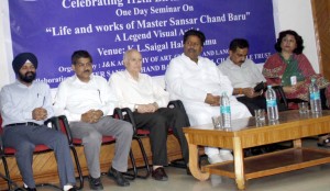 Minister for Culture and Sports Raman Bhalla, flanked by Director Tourism and others at a function held in Jammu on Wednesday.    	  —Excelsior/Rakesh