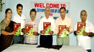 Dignitaries releasing annual college magazine of Sai Shyam College at Jammu on Thursday.