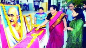 Additional Director, DPS Jammu, Dr. D Joseph along with others giving floral tributes to Mahatma Gandhi at School premises.