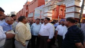 Kiran Wattal interacting with traders’ representatives of Shiva Ji Market Jammu on Thursday. 