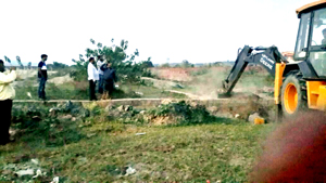 Authorities removing encroachments from State land at Bara, Samba on Saturday.