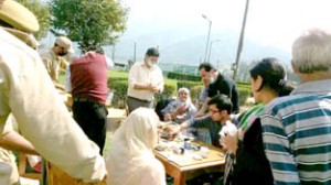 Doctors examining patients during medical camp organised by Rotary Club Jammu Tawi at Srinagar.