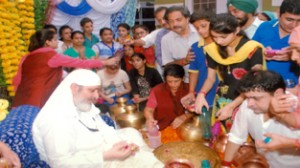 Swami Paul blessing his disciples.