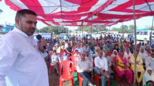 Ex-MP Madan Lal addressing public meeting at Dasgal in Akhnoor on Thursday.