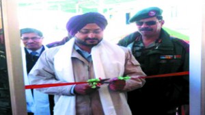 Deputy Commissioner Leh, Simrandeep Singh inaugurating central heating system in APS Leh on Thursday.