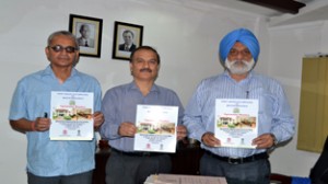 Outgoing JU VC Prof MPS Ishar releasing brochure of PG Diploma in Bio-Informatics on Thursday.