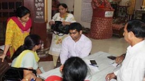 Doctors examining patients during free orthopaedic camp at Jammu.