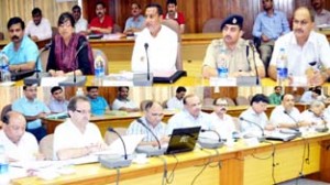 Minister for PHE, Sham Lal Sharma reviewing progress of relief, restoration work at DC office Udhampur.