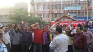 Public sector bank employees during a protest at Shalamar Chowk, Jammu on Thursday.
