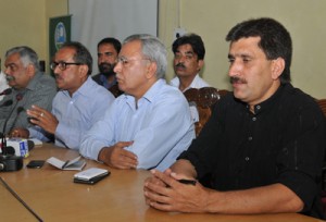 Dr Nirmal Singh interacting with media at Srinagar on Thursday. —Excelsior/Amin War
