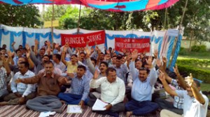 Teachers raising slogans in support of their demands during mass-hunger strike on Wednesday. 